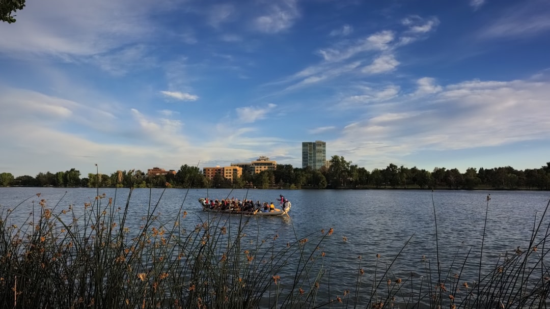 A focused athlete perfecting her paddling technique during dragon boat training on the water