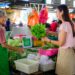 elderly-hawker-stall-singapore-unsplash - SINwebzine Elderly hawker serves at a traditional Singapore hawker centre,representing one of the city's most enduring Singapore rituals