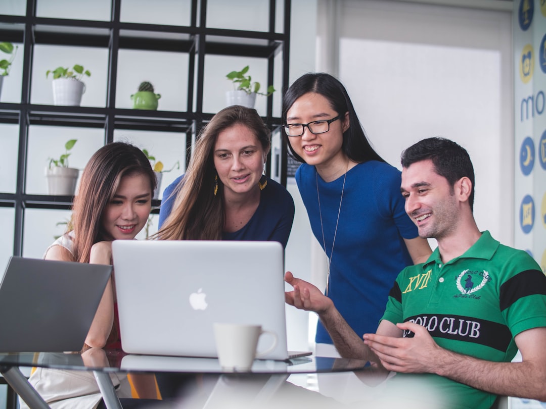 A group of young students collaborates on a venture project as part of a holiday accelerator in Singapore