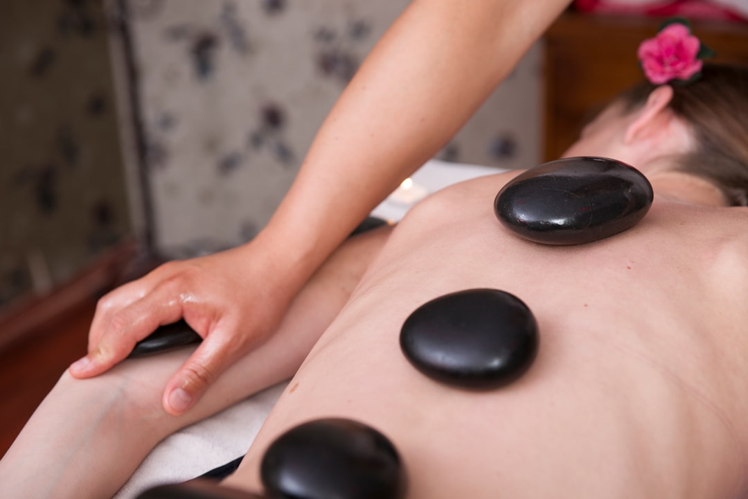 A couple enjoying a spa treatment as part of their luxury staycation package in Singapore