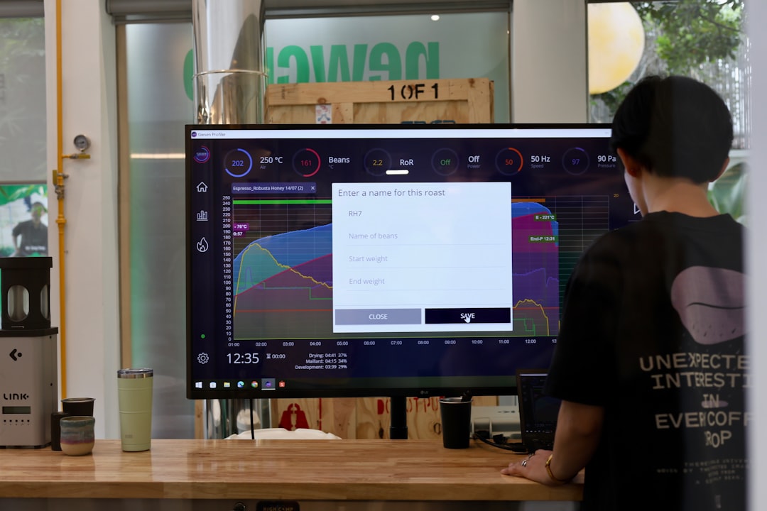 A technician monitors data on a smart water grid analytics platform connected to Singapore's water innovation network