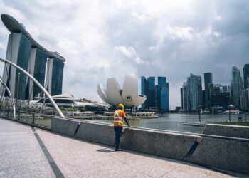 A Singapore architect reviews building plans designed to address the urban heat island effect in the Central District