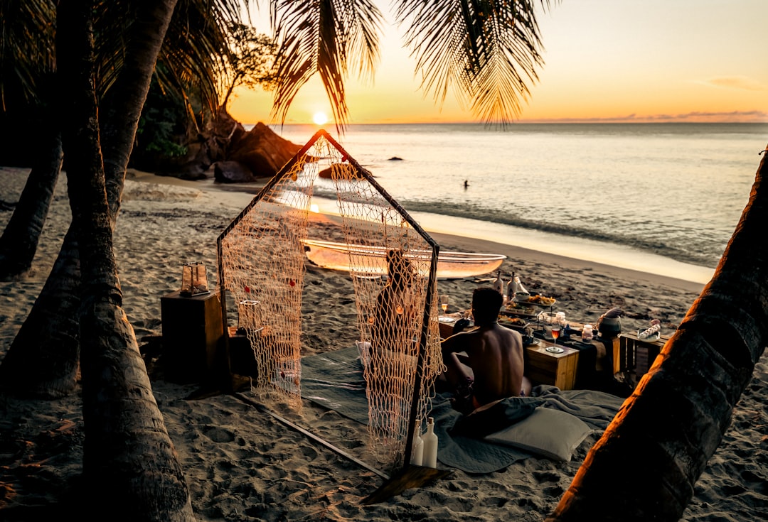 A couple enjoying a picnic on the beaches of the southern islands of Singapore