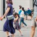 Tourists and shoppers walking along Orchard Road in Singapore as tourist arrivals reach a record high in July 2026