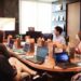 startup-meeting-unsplash - SINwebzine A Singapore startup founder reviews equity crowdfunding platform options on a laptop during a funding meeting