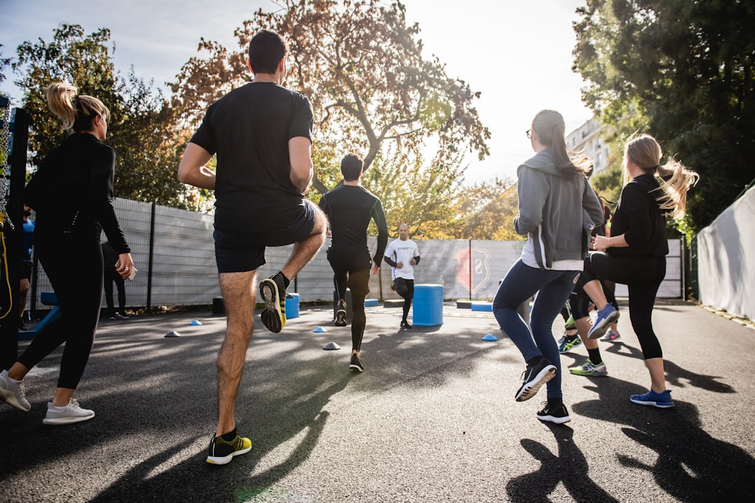 A group of participants taking part in a fitness event at a Singapore sport centre
