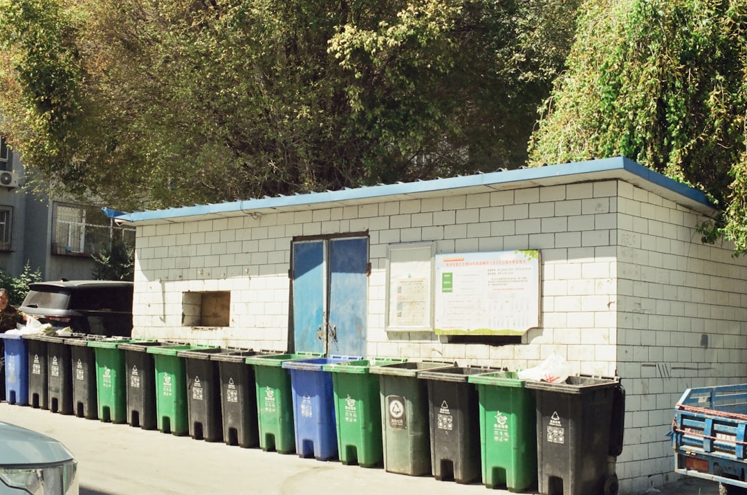 A resident carefully sorts recyclables at home as part of Singapore's zero waste label and recycling programme.