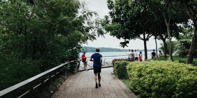runner-east-coast-park-singapore-unsplash - SINwebzine A runner training along East Coast Park as part of the Singapore running season before Formula 1 weekend