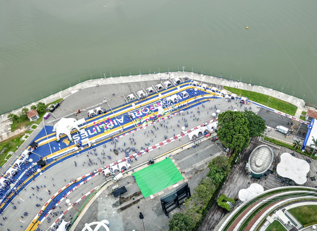 Runners competing in a fitness event along the waterfront at Marina Barrage Singapore