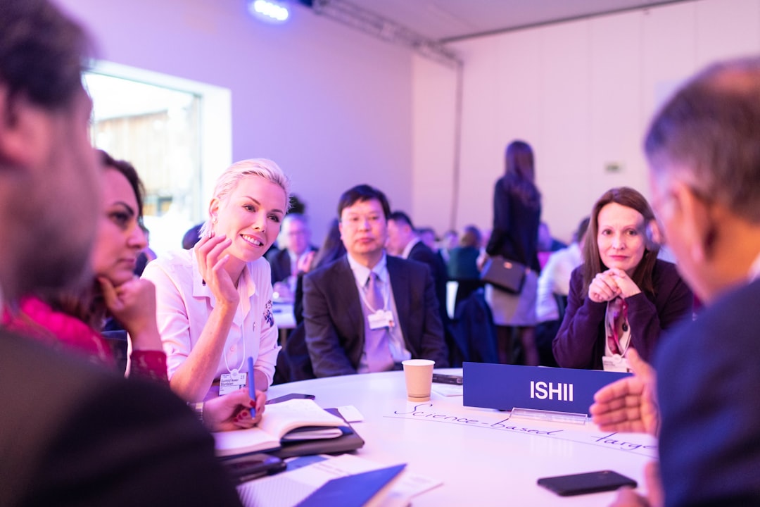 Business professionals attend a networking event in Singapore tied to the Singapore Grand Prix hospitality programme