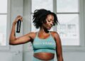 Humidity-proof makeup that lasts in Singapore photo 1 Woman applying humidity-proof makeup setting spray